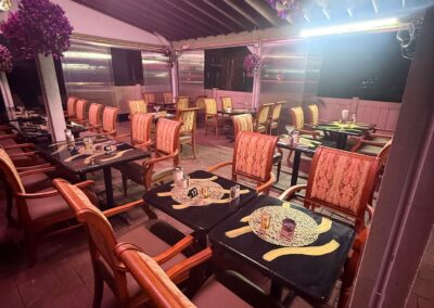 Outdoor hookah lounge with patio seating at Arabic restaurant in Clifton NJ
